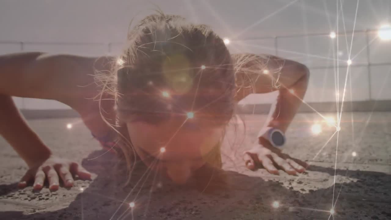 светящаяся сеть связей против белой женщины женщины, выполняющей упражнения на отжимание