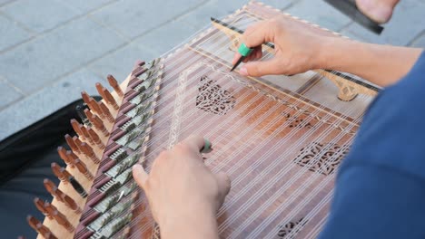 a musician playing the oud