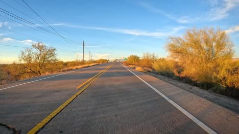 pov - driving on a road with traffic approaching interstate-10