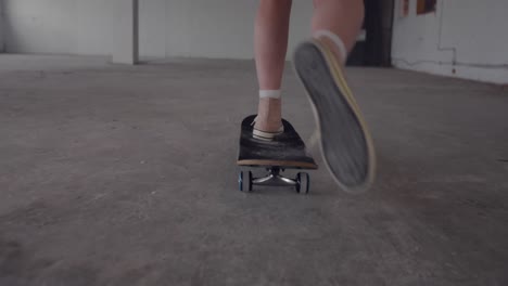 fashionable young woman in an abandoned warehouse