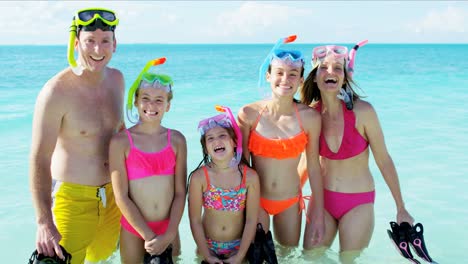 portrait of caucasian family enjoying fun going snorkeling
