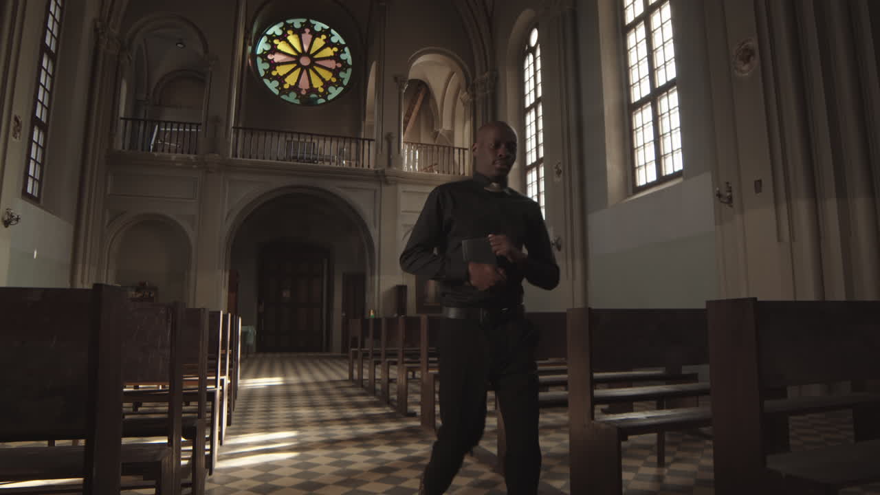 African Priest Going along Lutheran Church