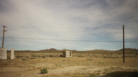 abandoned building in the middle of the california desert