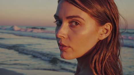 woman on beach at sunset