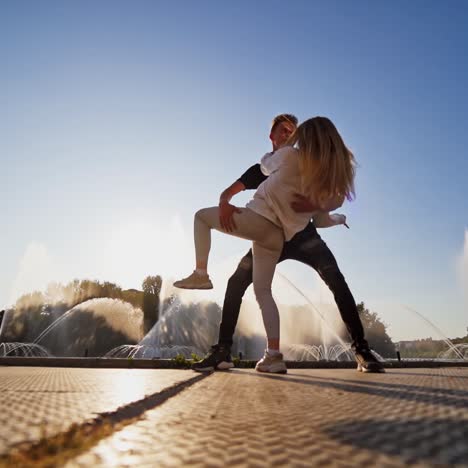 couple of lovers dancing on street