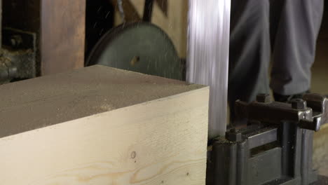 sawtooth sawing block of wood in workshop factory,close up shot - prores footage