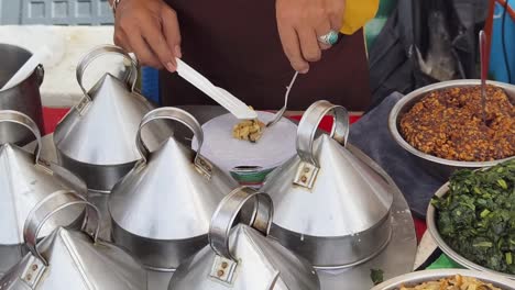 street food vendor preparing steamed food