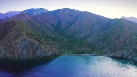 Panoramic-idyllic-scenery-of-mountainous-wild-seashore-with-woodland-valley-in-Turkey-before-sunrise