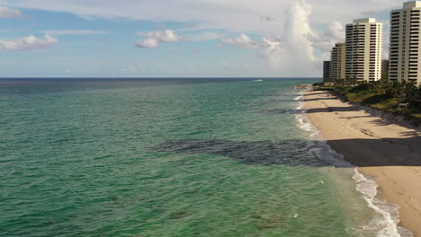 an aerial view of luxury apartments in florida in front of the atlantic ocean