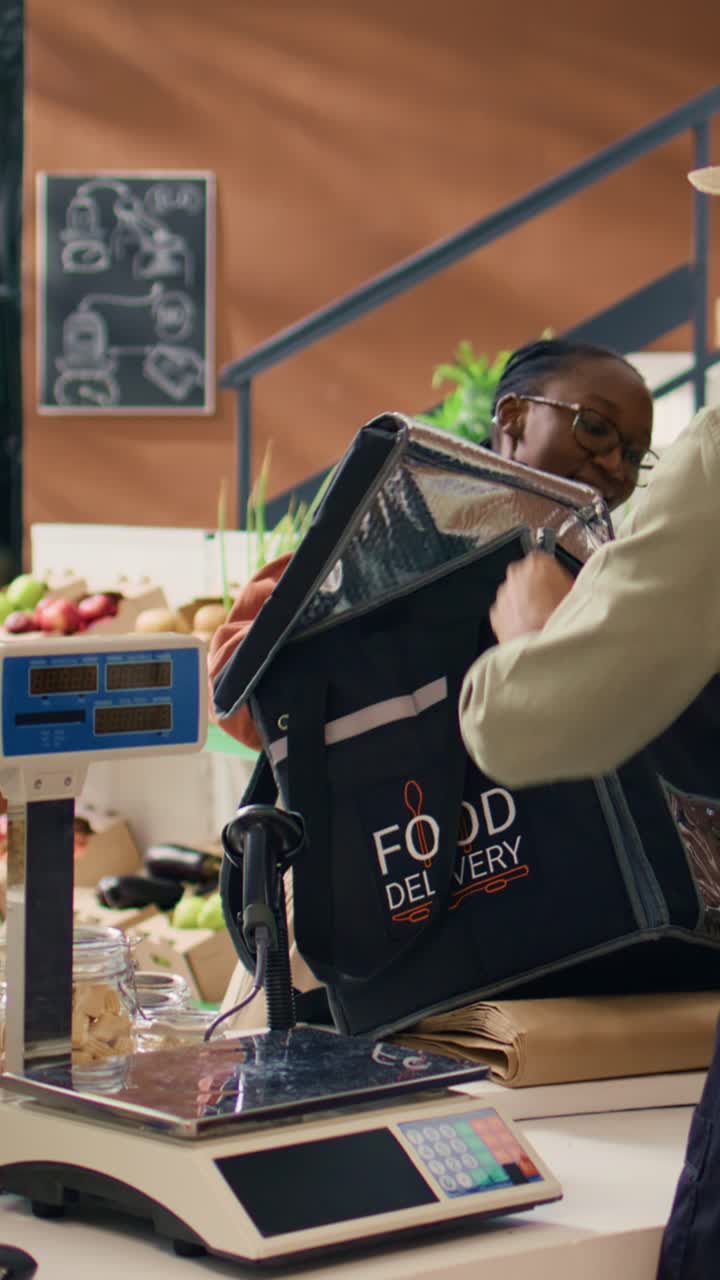 Vertical video Seller prepare groceries for delivery