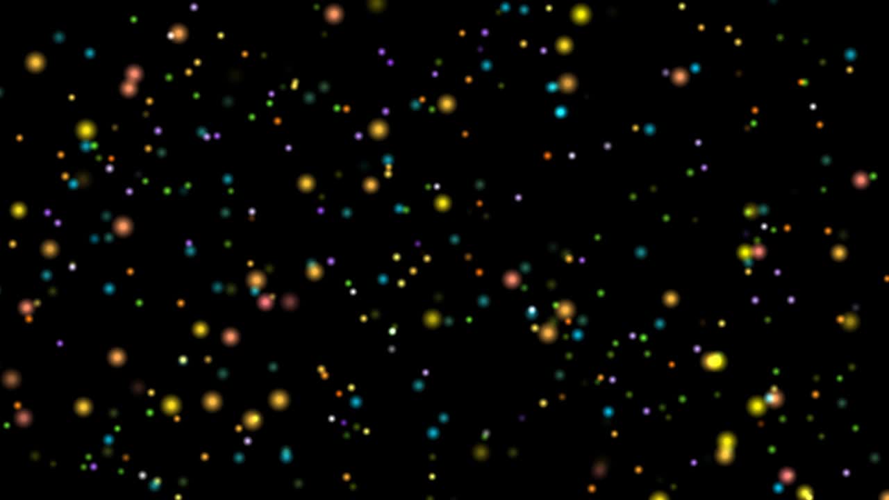 Piccole luci sfocate multicolori che volano su sfondo nero. Sfondo video astratto animato