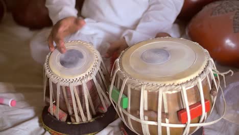 setting up traditional indian drums