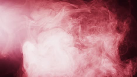 Video-of-red-clouds-of-smoke-moving-with-copy-space-on-black-background