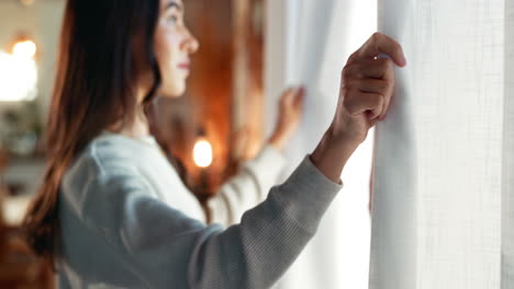 woman looking out of a window