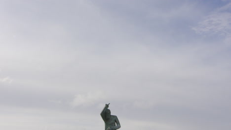 st john or san juan statue seaside with sky background