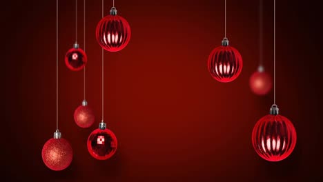 Animation-of-red-christmas-baubles-on-red-background