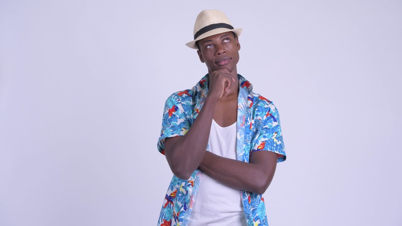 Young handsome African tourist man ready for vacation