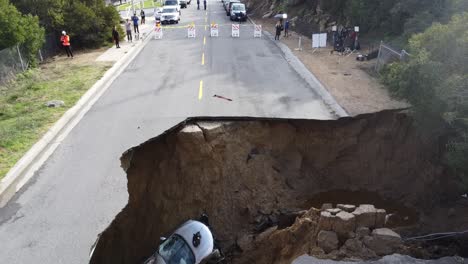 road closed after major sink hole