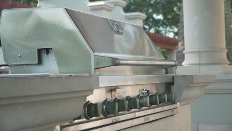 luxury gas grill on a warm summer day