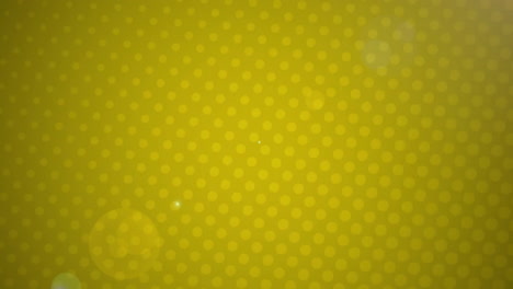 animation of light spots over spots on yellow background