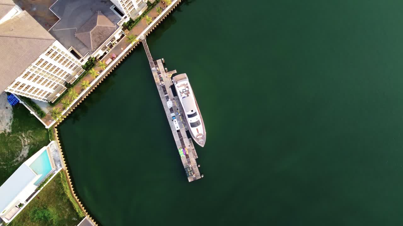 Top down spinning drone shot of yacht