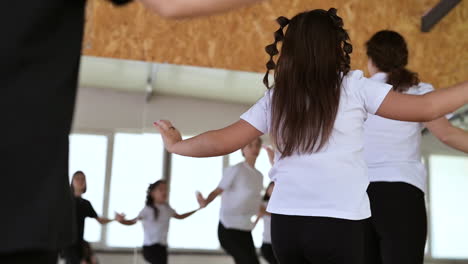 teacher and pupils in dance class