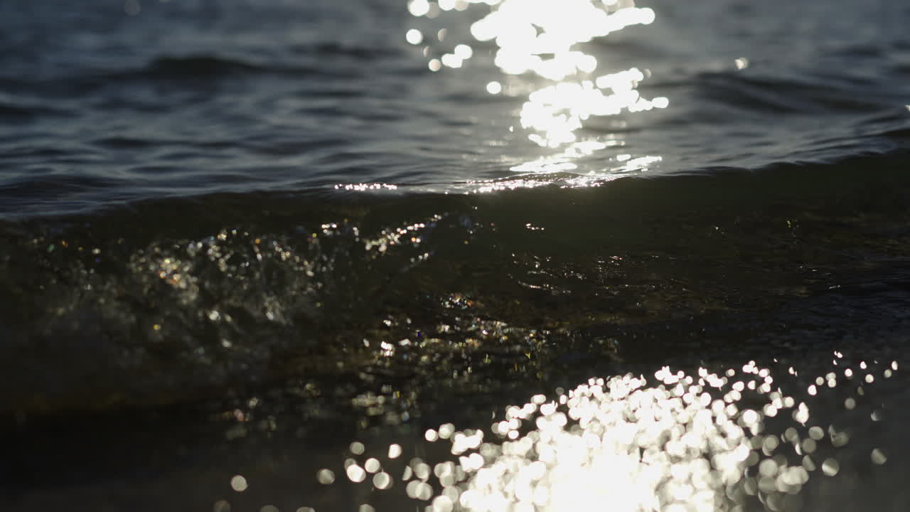 Water waves reflecting sunlight