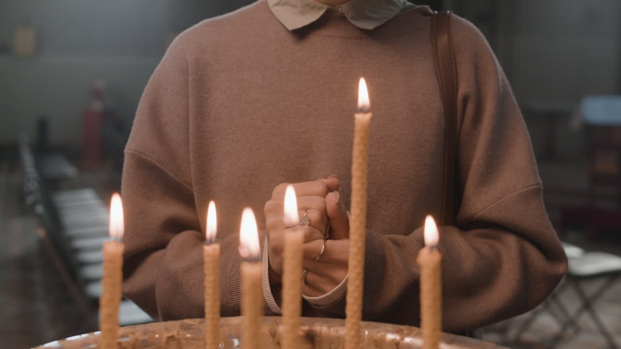 Praying with Candles in Church