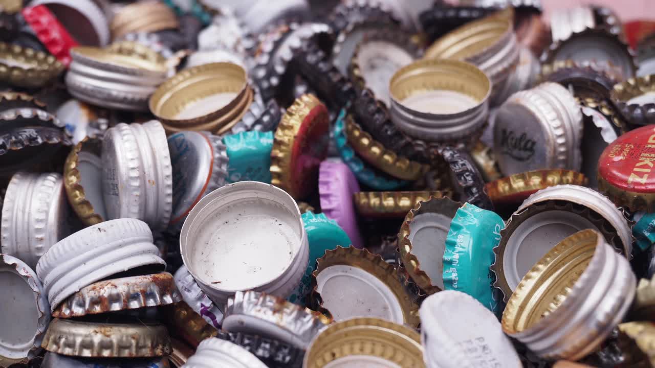 A Pile of Used Bottle Caps