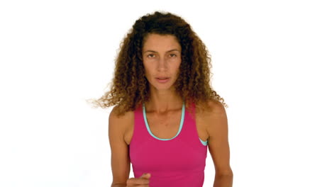 female athlete running on a white background