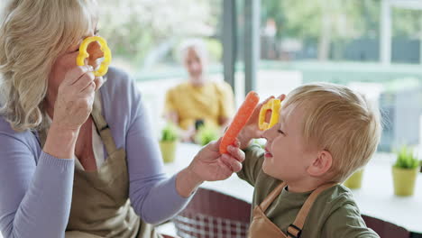 grandmother and grandchild playing with vegetables