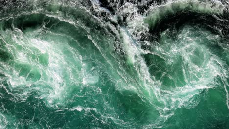 Blue-waves-of-water-of-the-river-and-the-sea-meet-each-other-during-high-tide-and-low-tide.