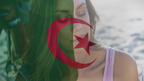 algerian flag animation over woman with closed eyes near water