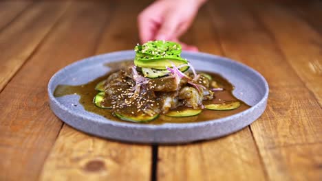 aguachile plate, traditional mexican dish on a wooden table