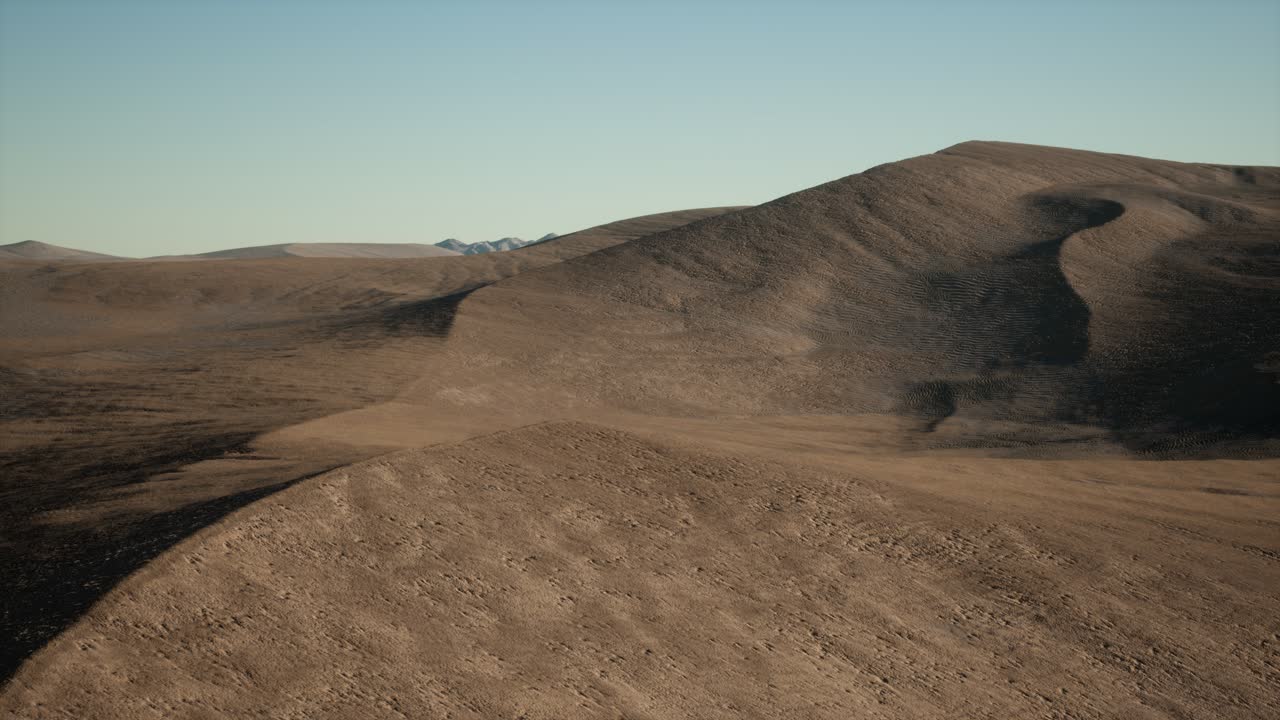 Aerial view on big sand dunes in Sahara desert at sunrise