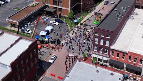 low aerial orbit of the filming of holland michigan on location in downtown clarksville tennessee