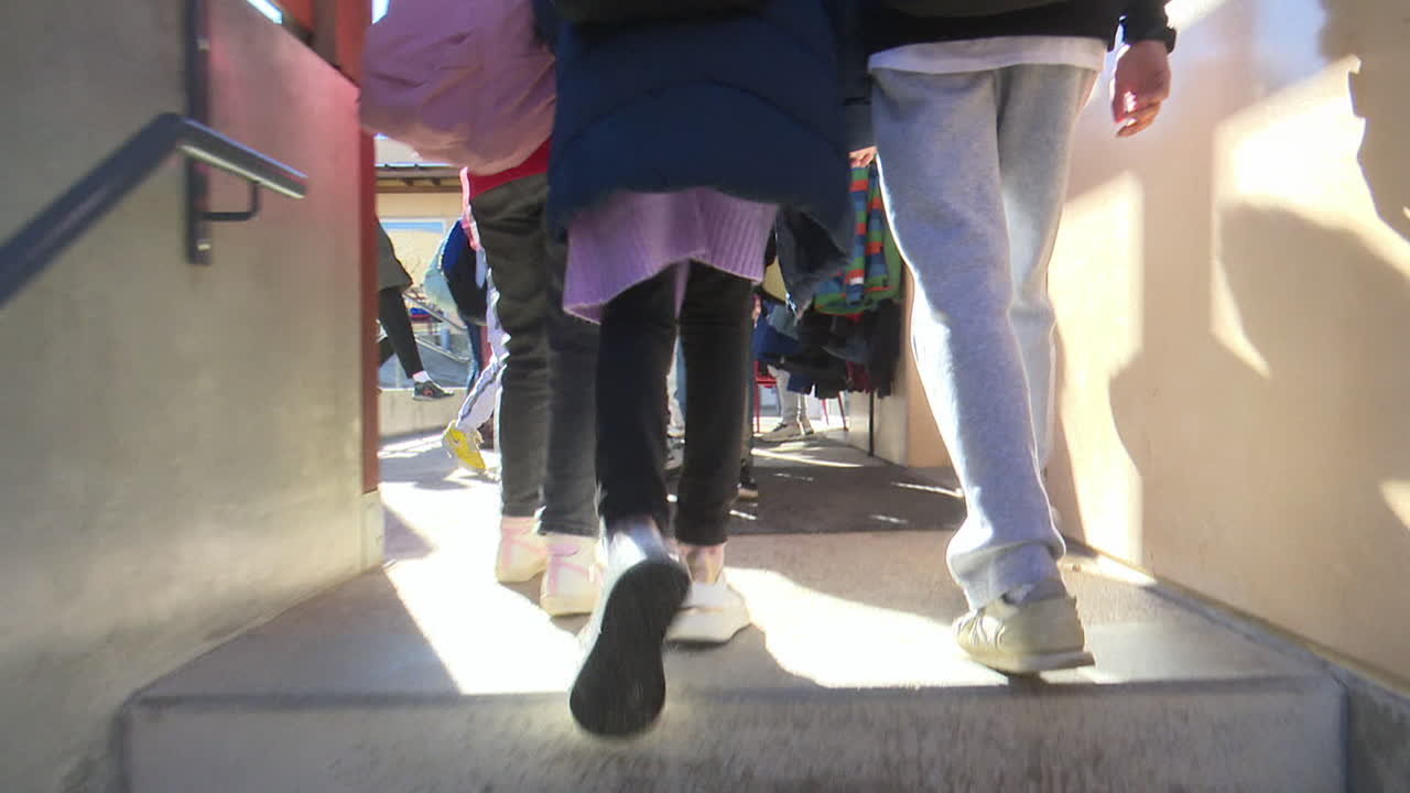 Children Walking Up Stairs to School