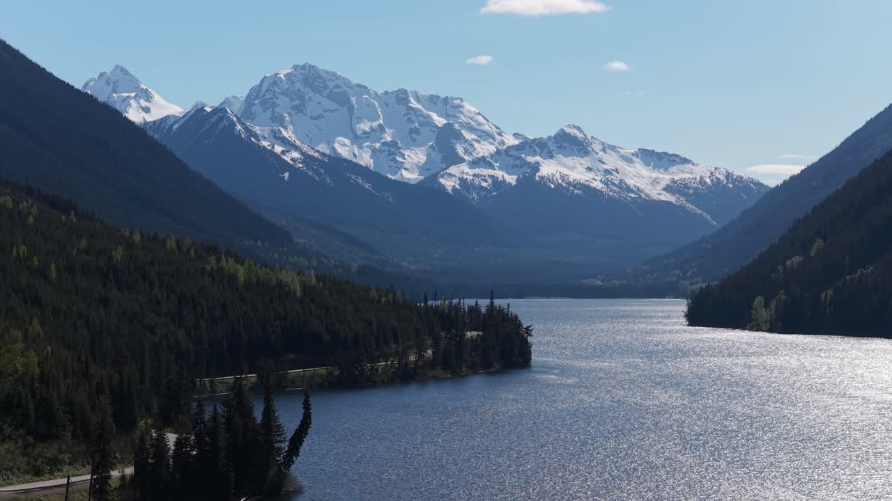 Majestic Snow-Capped Mountains Reflected in a Serene Lake in British Columbia, Canada