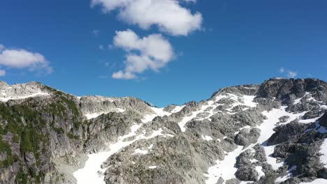 snowy slopes of squamish mountains in the summer