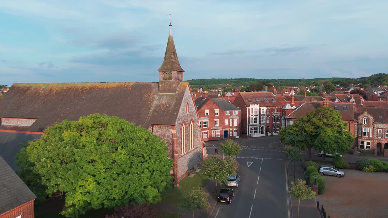 A charming church and surrounding houses in sheringham, england, aerial view