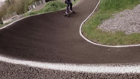 Eboarding-footage-around-a-BMX-pump-track