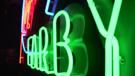 close shot of a green neon sign in polish