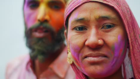 multi ethnic people celebrating the festival of colors holi in india