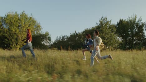 friends running through a field