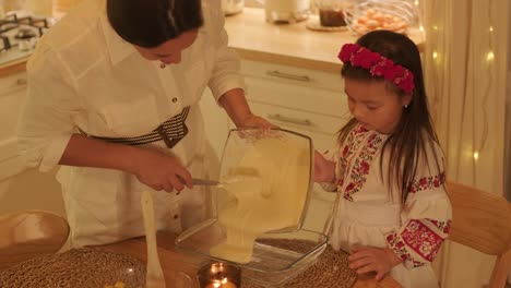 mother and daughter preparing for christmas celebration