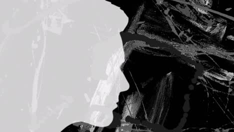 animación del perfil blanco de un hombre sobre pinceladas de pintura gris orgánica que se mueven sobre un fondo negro