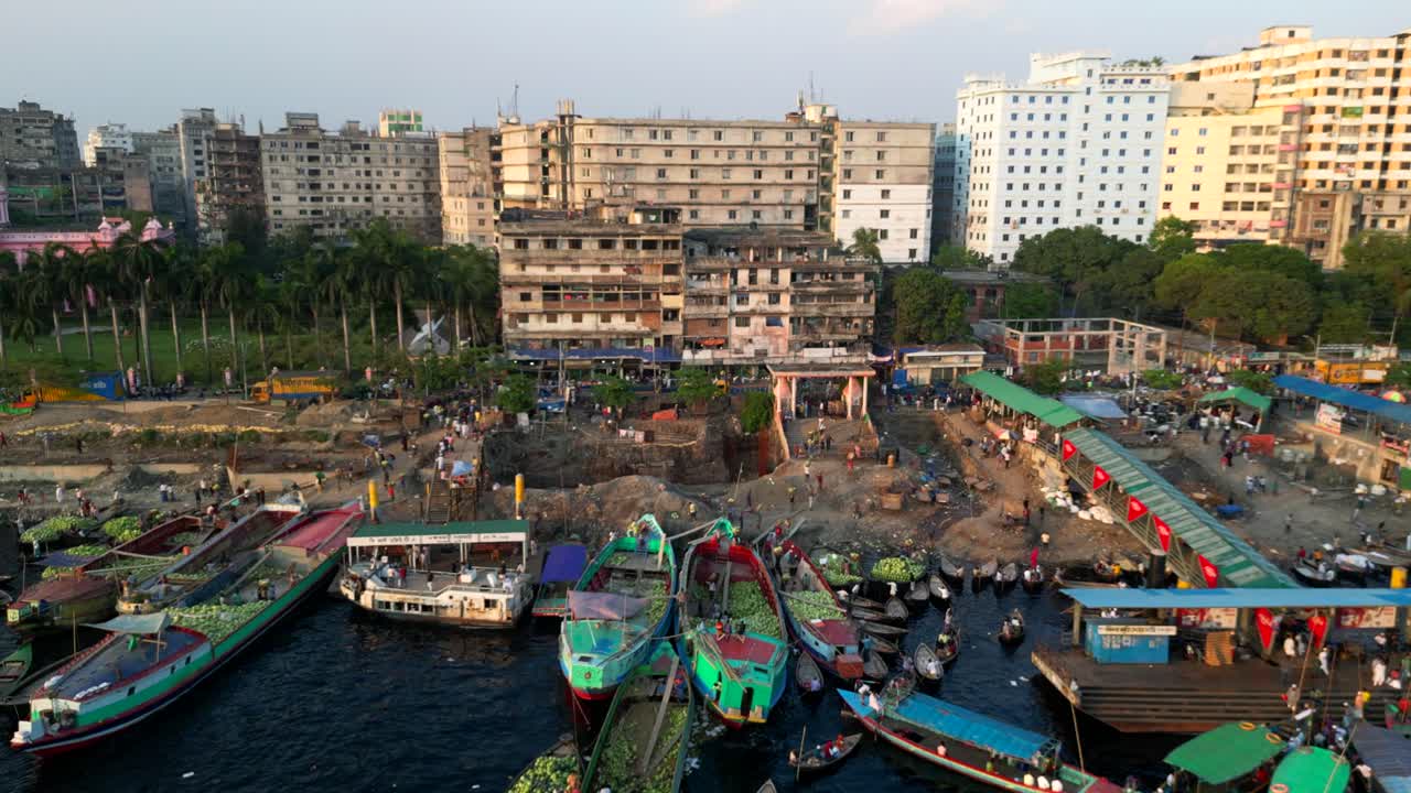 Drone shot Dhaka city in Bangladesh. Boats and ships docked in port