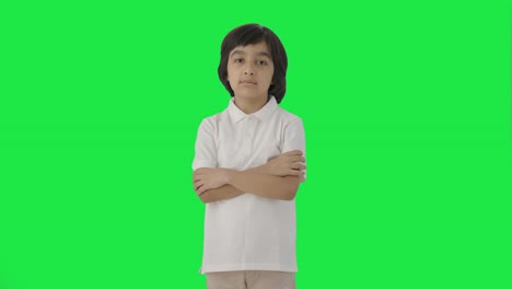 Confident-Indian-boy-standing-crossed-hands-Green-screen