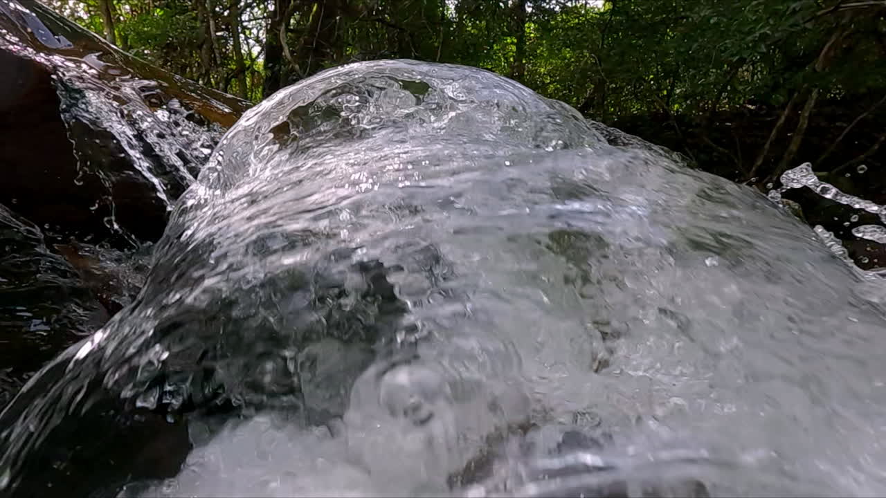 Tropical powerful water, dynamic flow, bewitching nature, slow motion