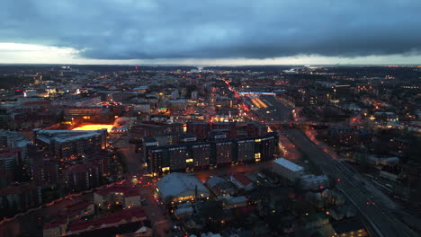 aerial view of the turku cityscape and the main railway station, gloomy evening